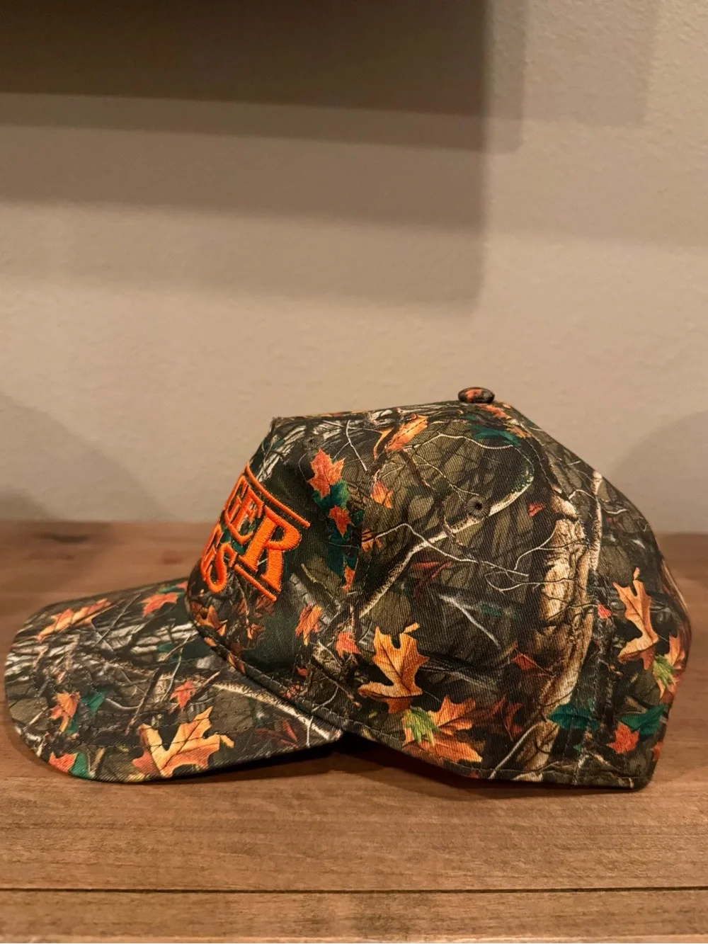 Stranger Things hard to find bright orange and camo embroidered SnapBack hat